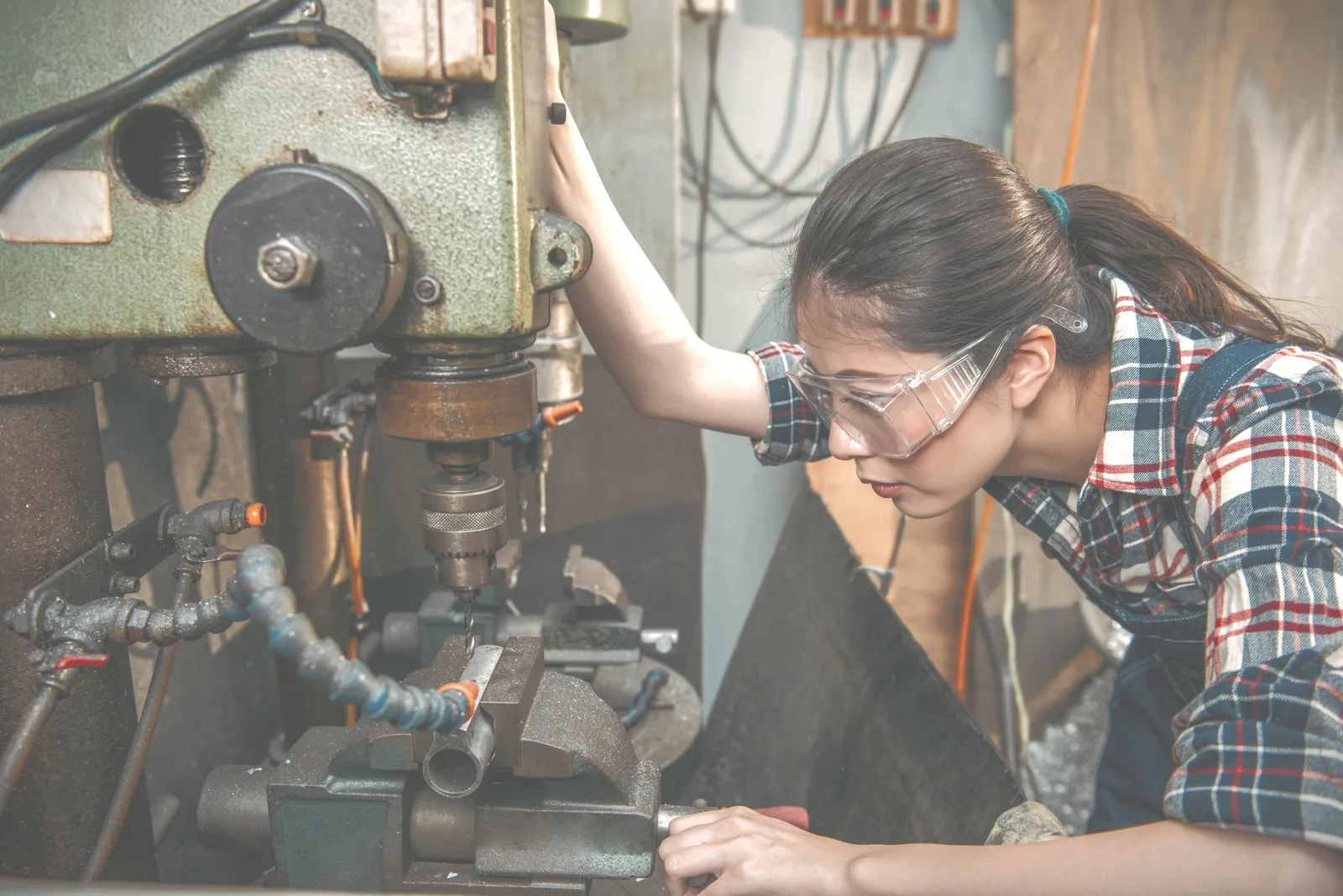 A machinist at work on the shop floor